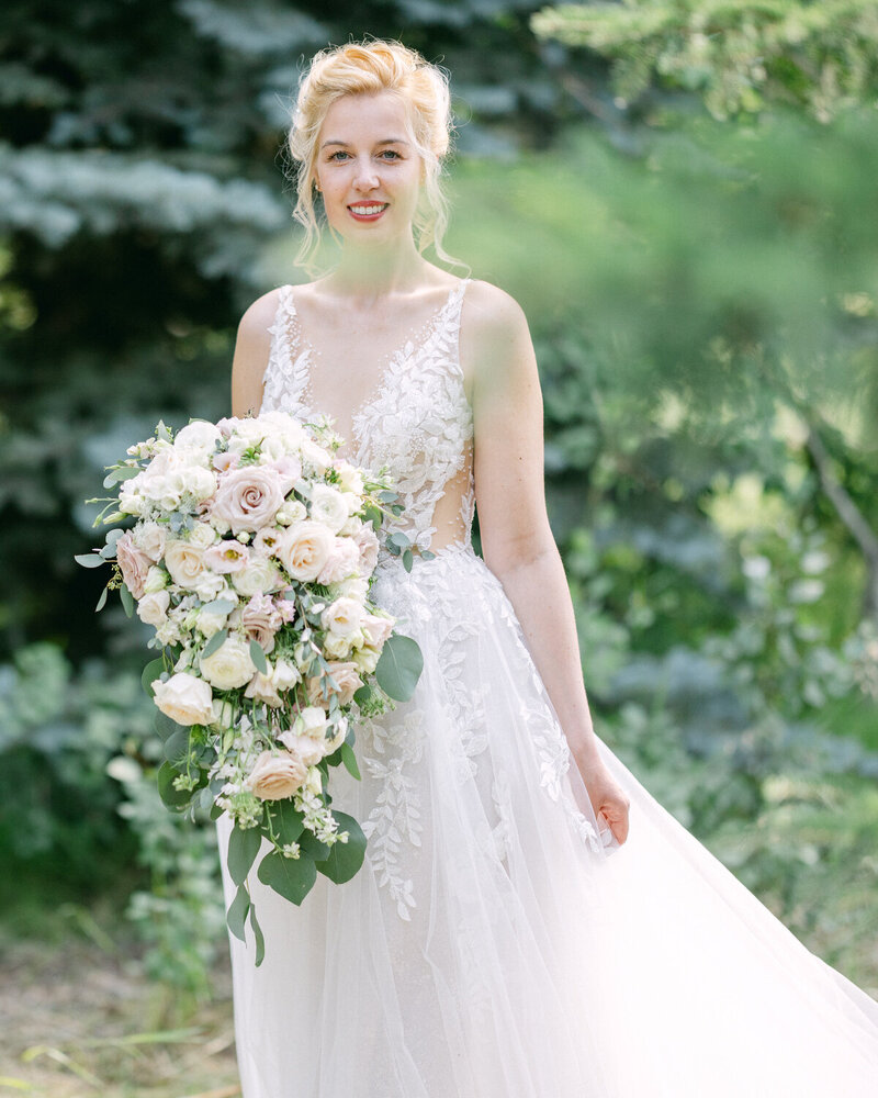 This elegant bridal portrait captures the bride on her wedding day after a beautiful celebration at The Nash in Inglewood, Calgary, highlighting her grace and the charm of the historic venue.