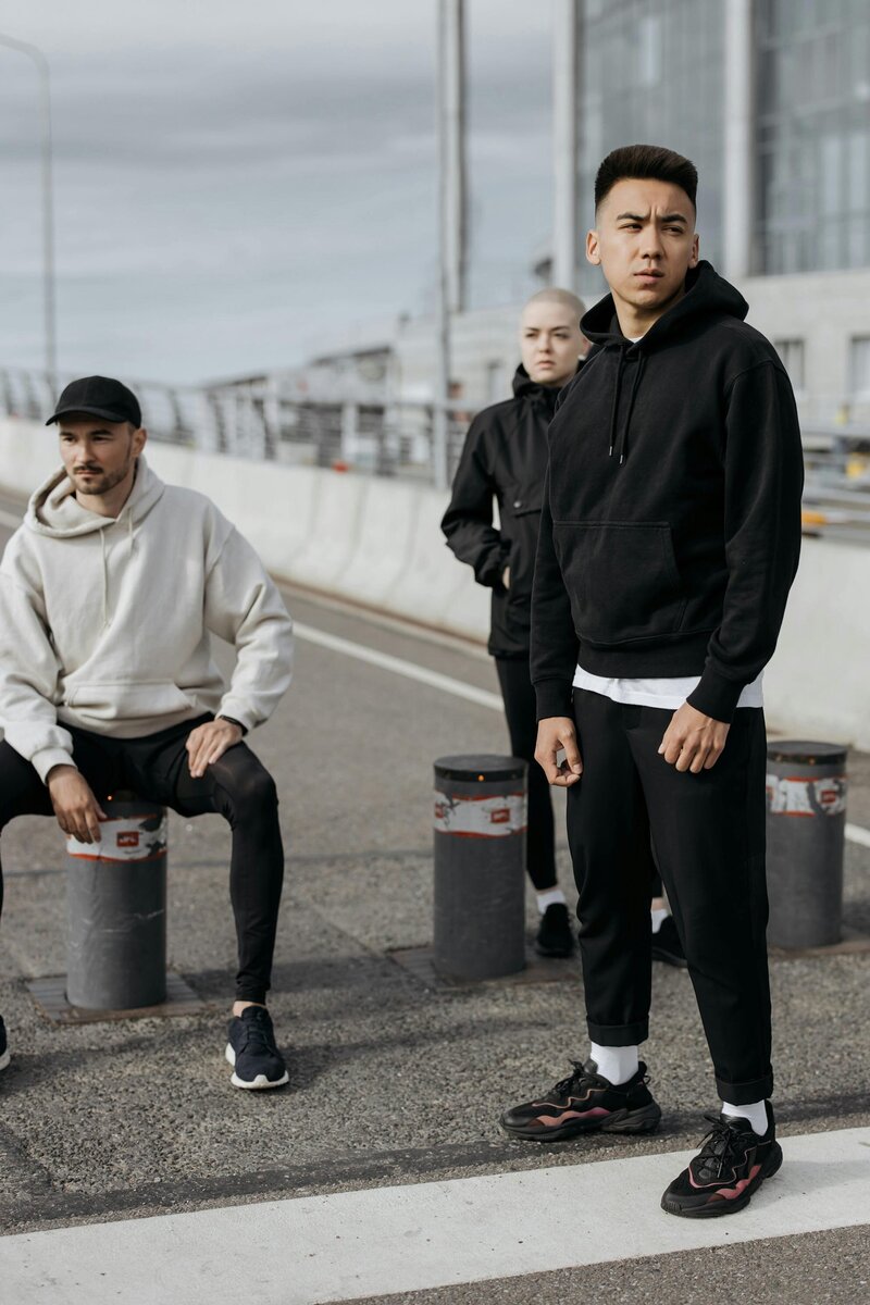 Personal trainers standing on road