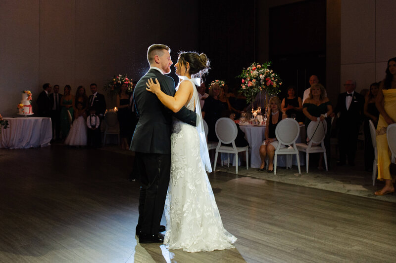 a bride and groom take their first dance during their Chateau Le Parc wedding reception.  Captured by Ottawa wedding photographer JEMMAN Photography