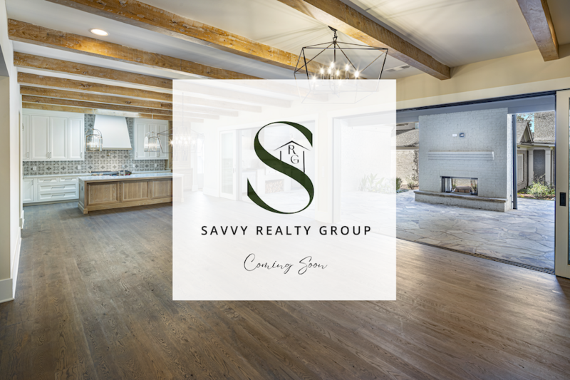 Blue Butterfly resting on a gravel driveway.