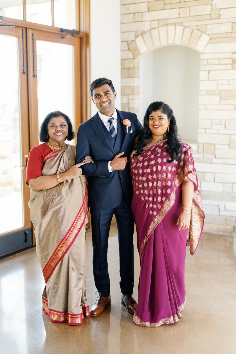 Family portraits at Canyonwood Ridge with Hill Country backdrop