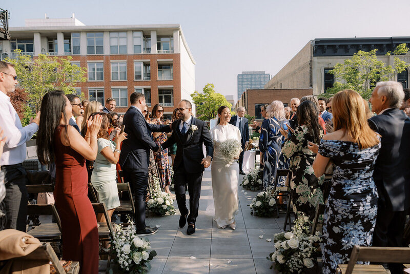 wedding ceremony at Loft Lucia in Chicago, captured by Chicago wedding photographer Abe Fernandez in a documentary and film style