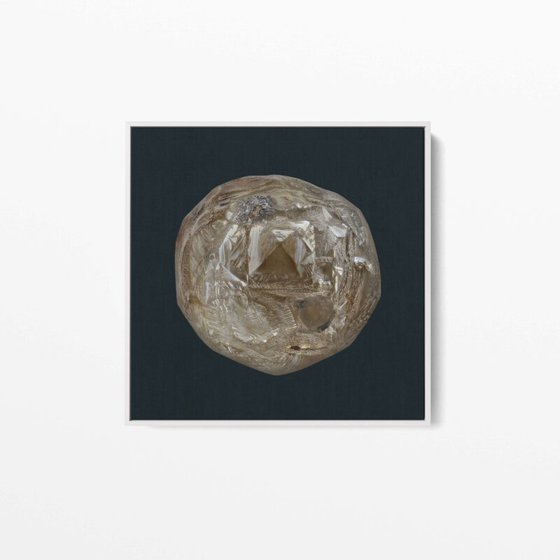 Fine Art Canvas with a white frame featuring Project Stardust micrometeorite NMM 3230 collected and photographed by Jon Larsen and Jan Braly Kihle