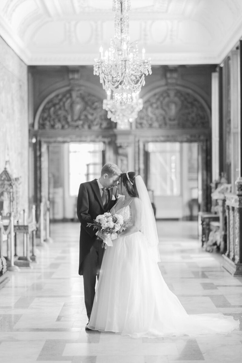 Couple stands together at the Anderson House in Washington DC