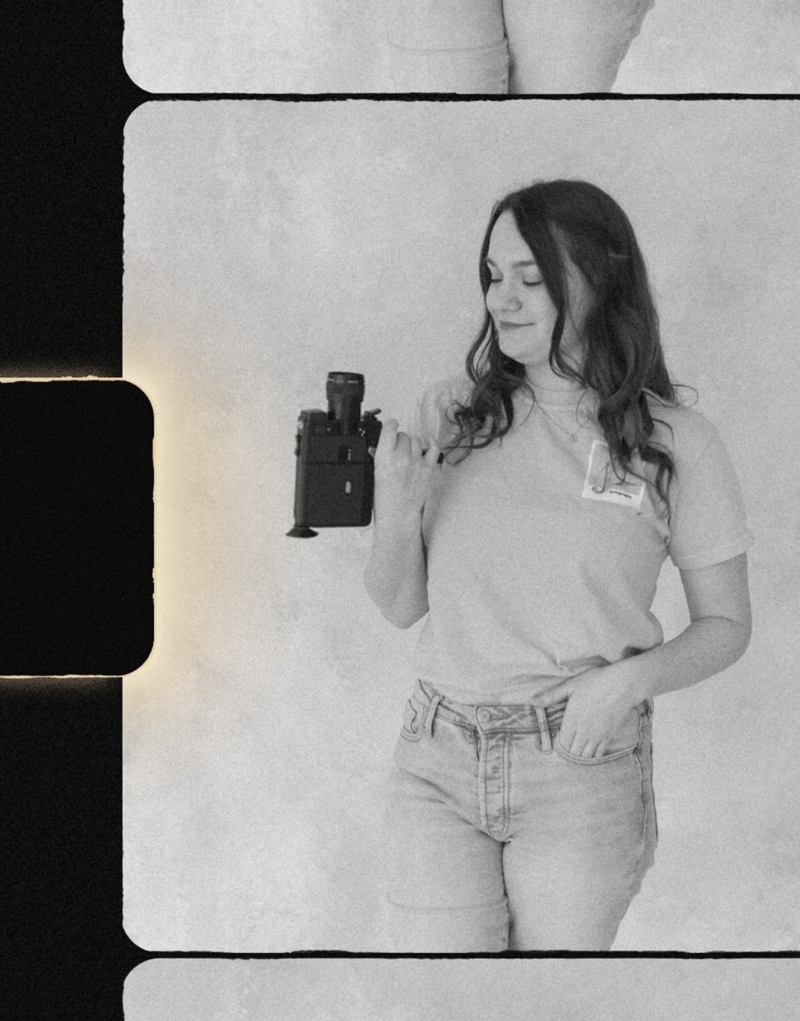 black and white image of photograpehr holding Super 8 film camera