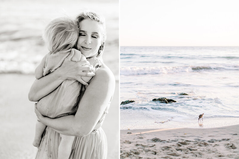 Black & white photo of a mom hugging her baby on the beach during a family photography session