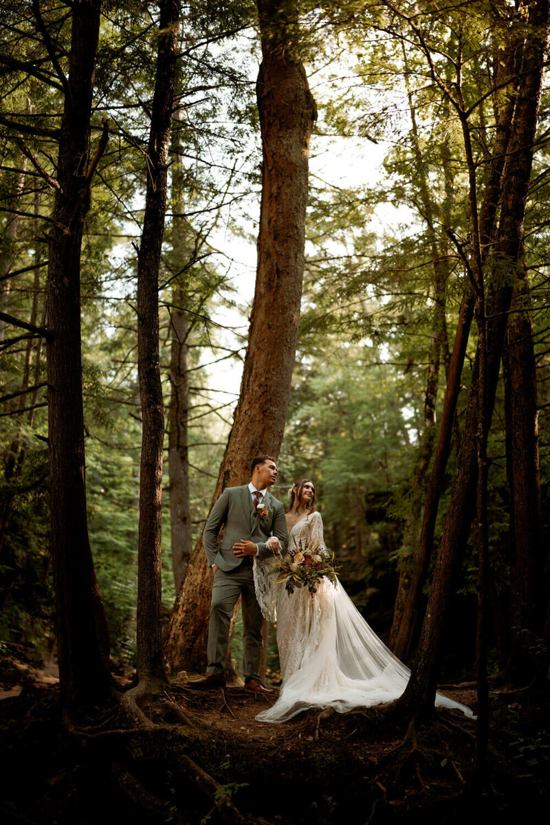 Woodsy elopement picture with boho couple
