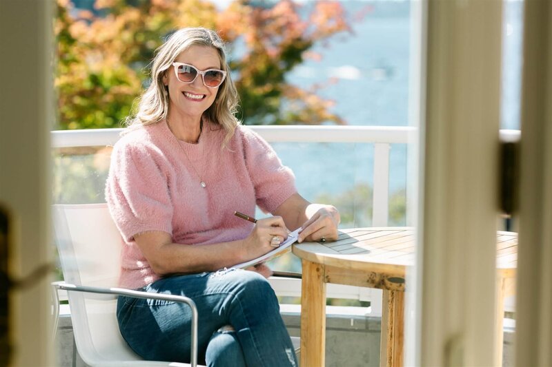 Phillipa Leseberg | His Name is Eric portrait of author writing His Name is Eric wearing pink sweater with blonde hair and sunglasses.