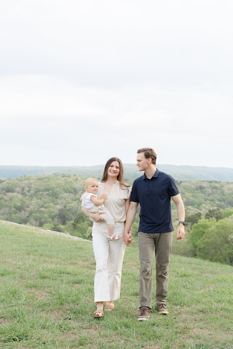 family walking together during a photo session on Raccoon Mountain