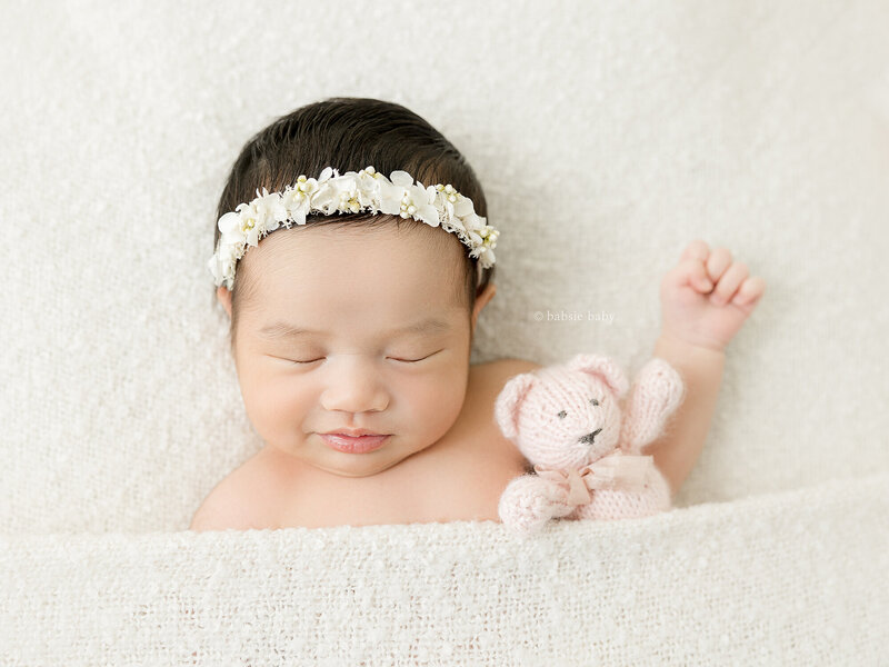 A baby girl photo at her newborn session at Babsie's San Diego North County studio.