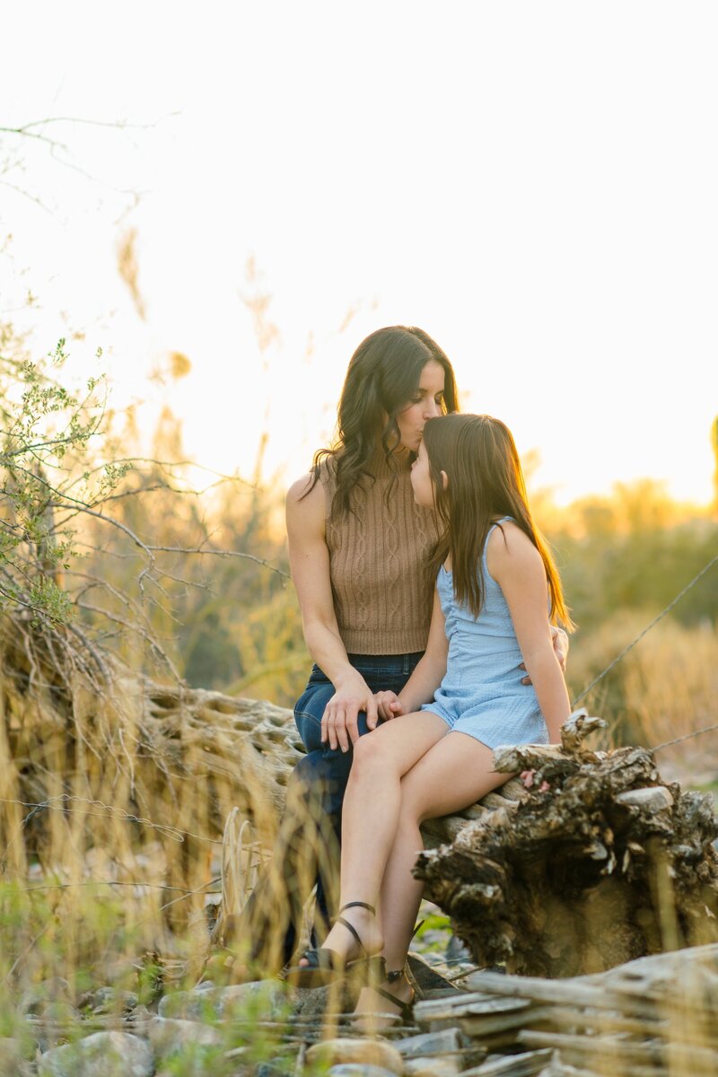 Mother and daughter posing for family photos  in Silverleaf Neighborhood in Scottsdale Az