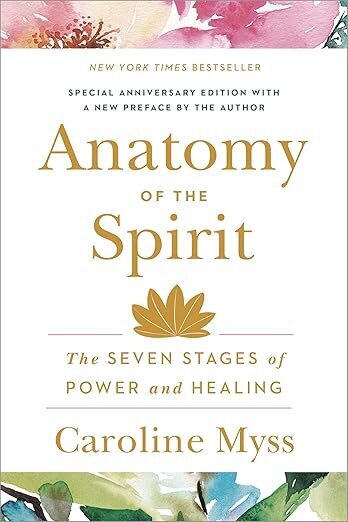 The cover of Anatomy of the Spirit by Caroline Myss displays elegant gold typography with floral accents, highlighting the subtitle “The Seven Stages of Power and Healing.