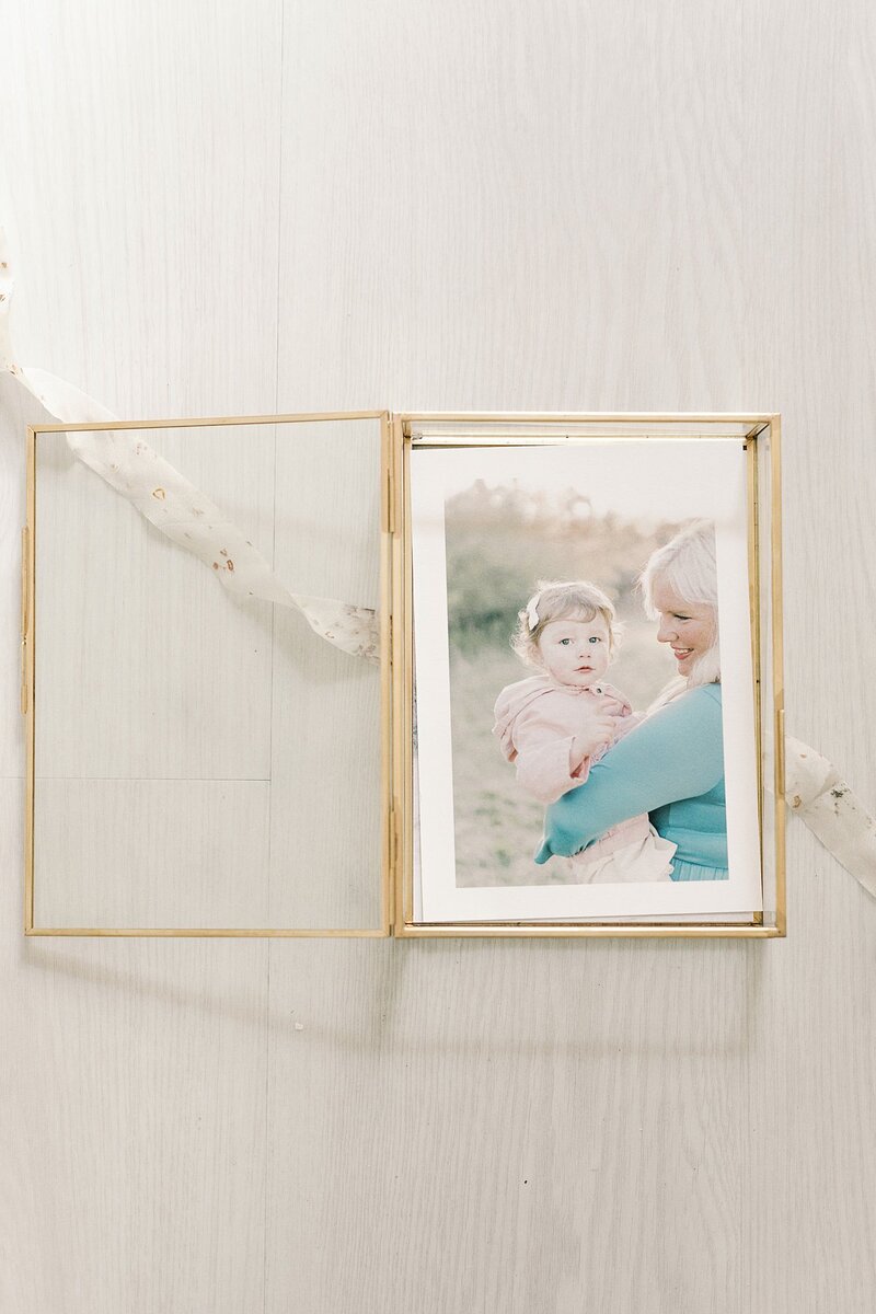 Glass box showing prints from a Richmond Family Photography session.