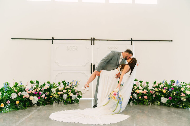 Bride-Groom-Flowers-Sliding-Door-The-Legacy-at-Willow-Pond
