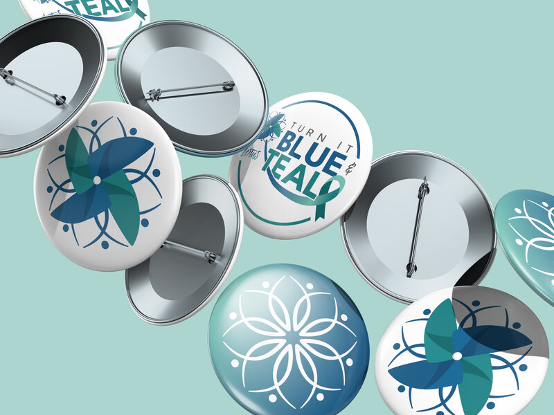 Turn it teal and blue pin for awareness months for Lotus Children’s Advocacy and Sexual Violence Resource Center design by Amanda Newman Design in Paducah, Kentucky