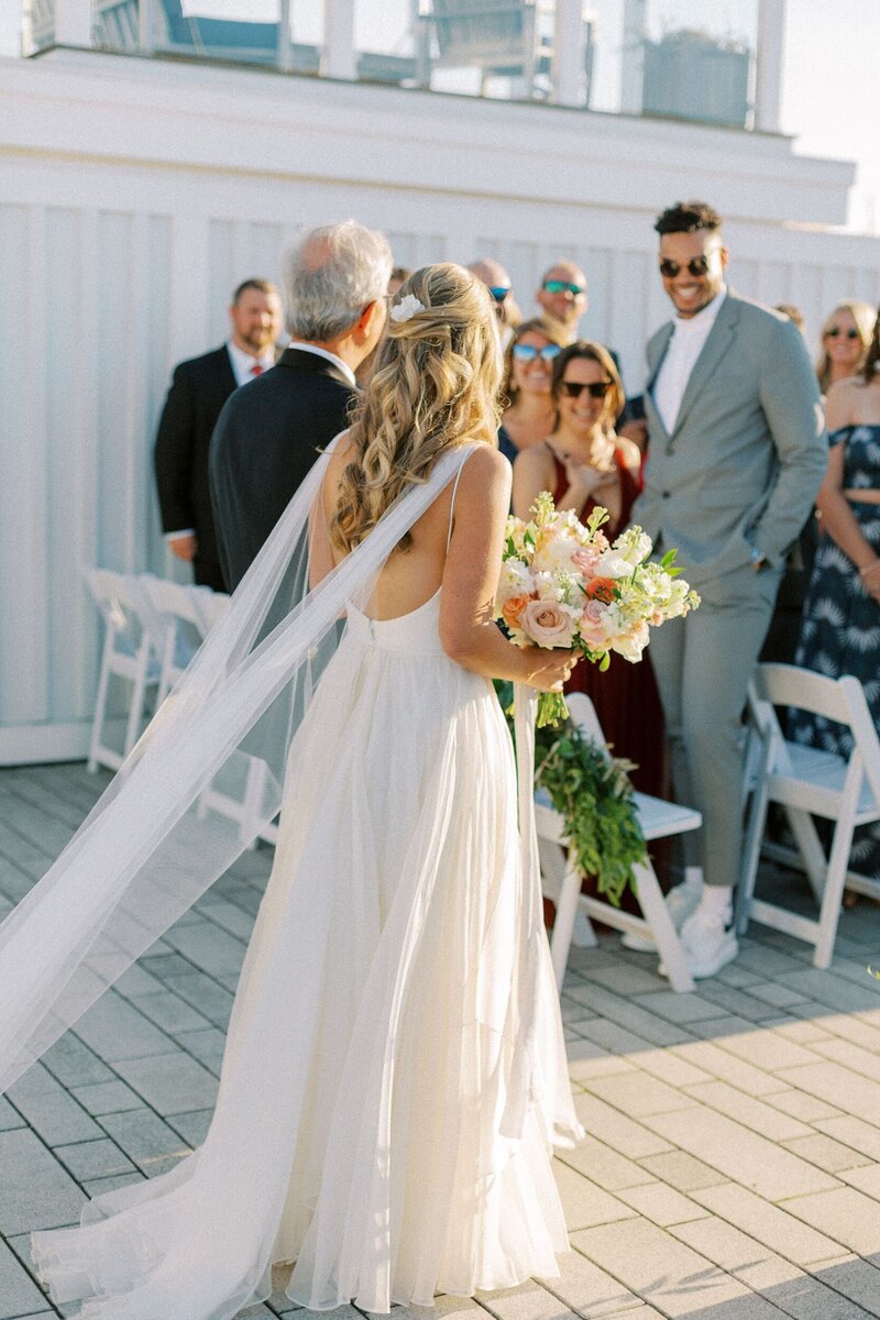 Bride walking down the aisle at Newport wedding
