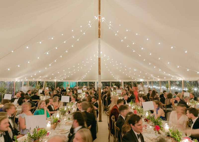 chloe-winstanley-weddings-sailcloth-tent-dinner-guests