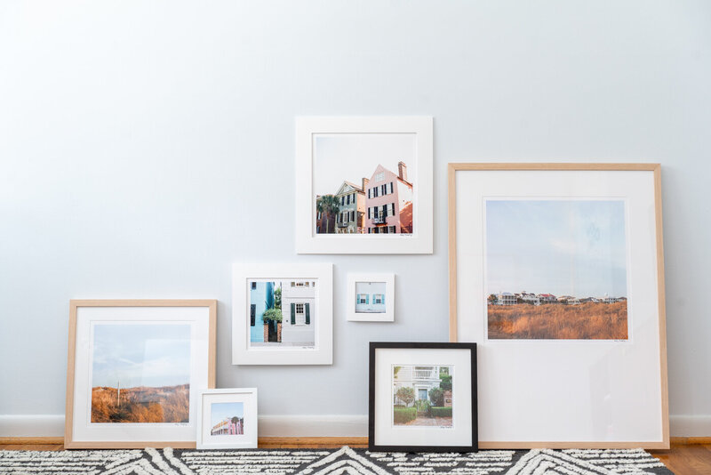 A variety of framed and matted Charleston, SC art prints photographed by local artist Abby Murphy