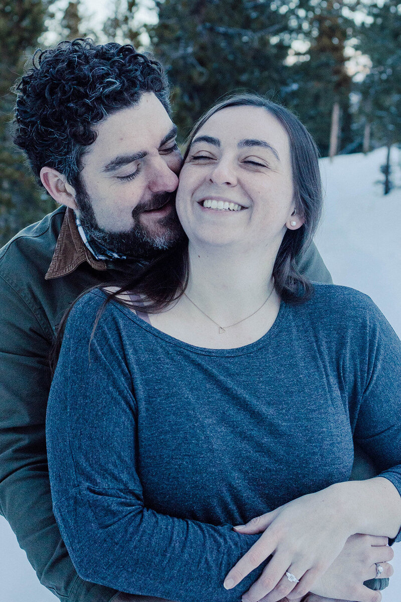 couple posing at the iconic winter park ski resort