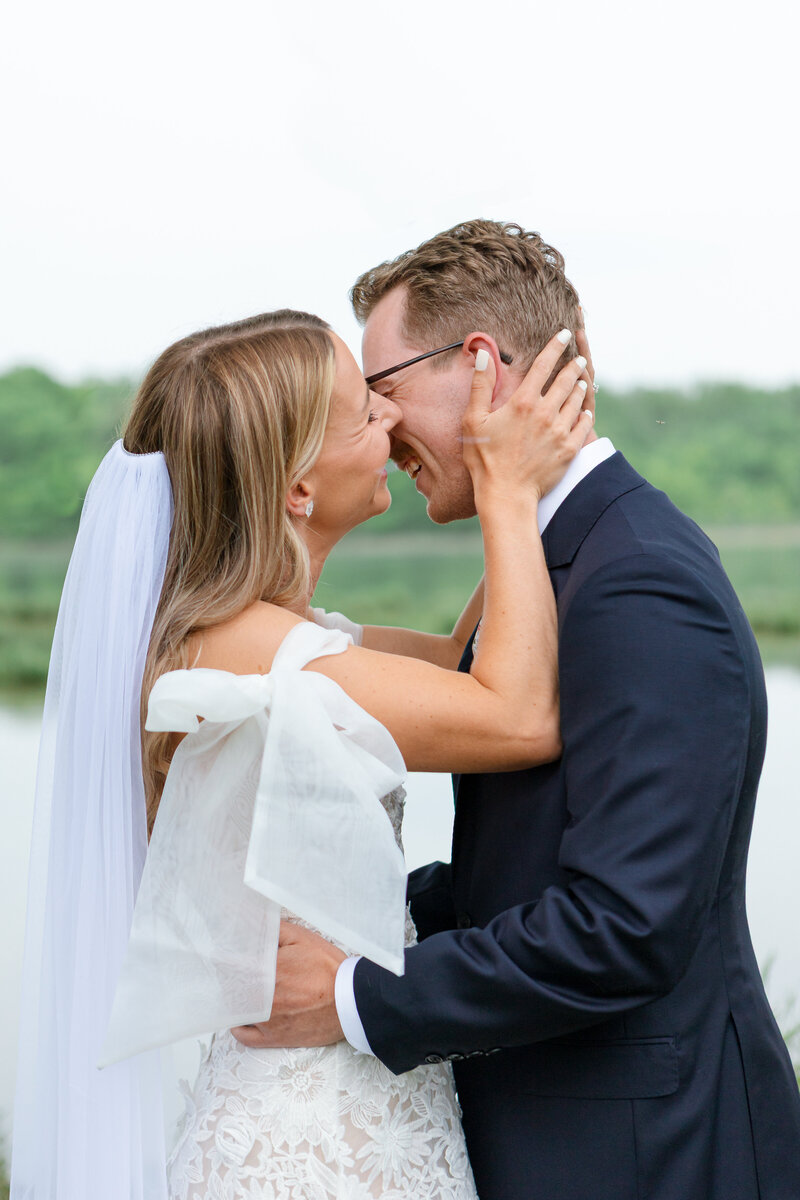 attooed couple sharing a candid moment during their alternative wedding in Springfield, MO, photographed by Chelsea Stanford.