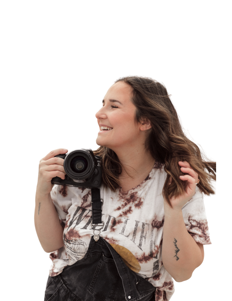 woman posing with camera