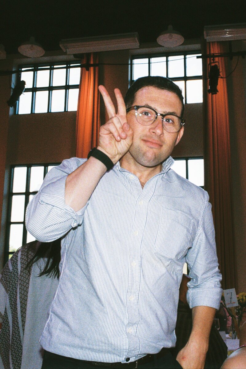 Candid portrait of a wedding photographer at a wedding in Fort Worth, Texas