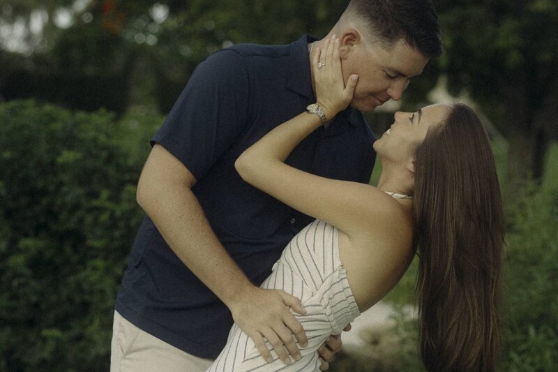 couple leans in for a kiss 