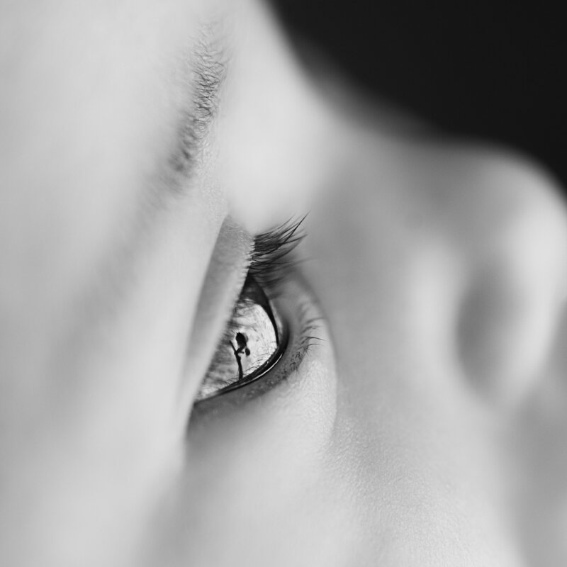 A soulful macro capture of a newborn’s eye—where every blink reveals a brand new view.