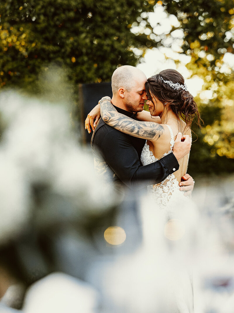 Bride and groom share an intimate first dance, captured in a warm and candid documentary style.