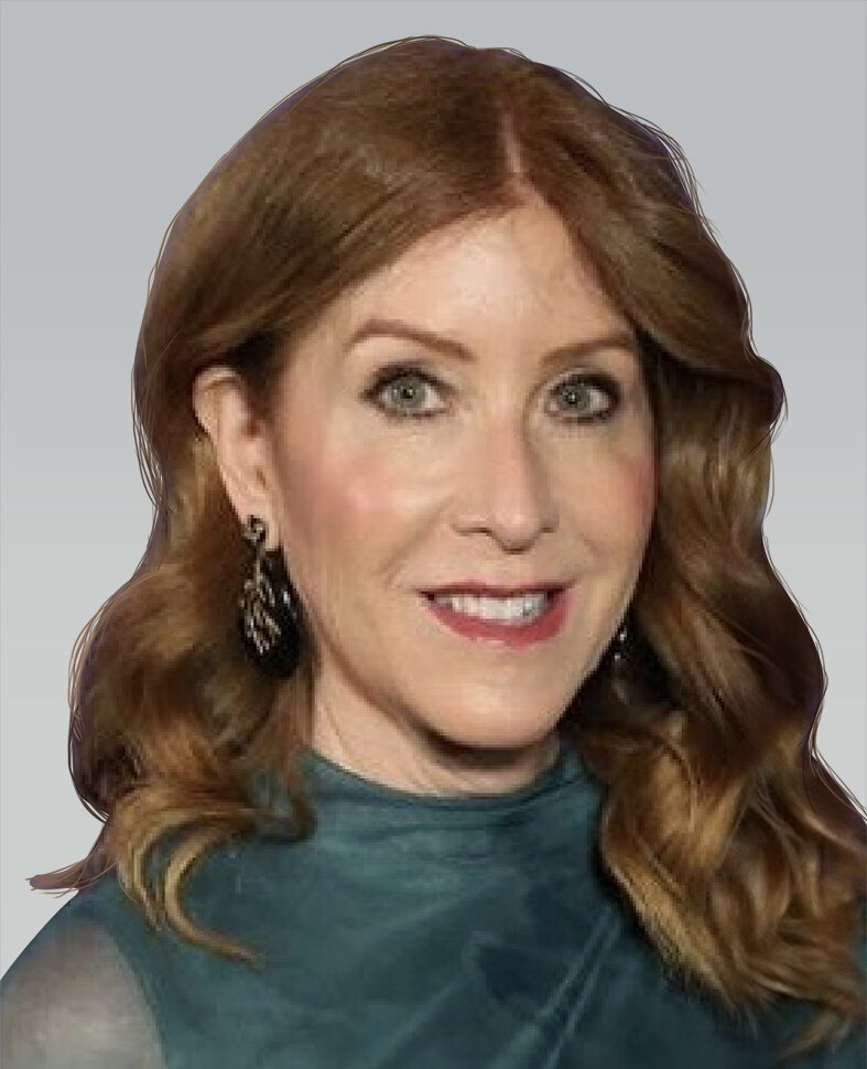 Headshot of a woman with long auburn hair and light eyes wearing a high neck, green, silk top.
