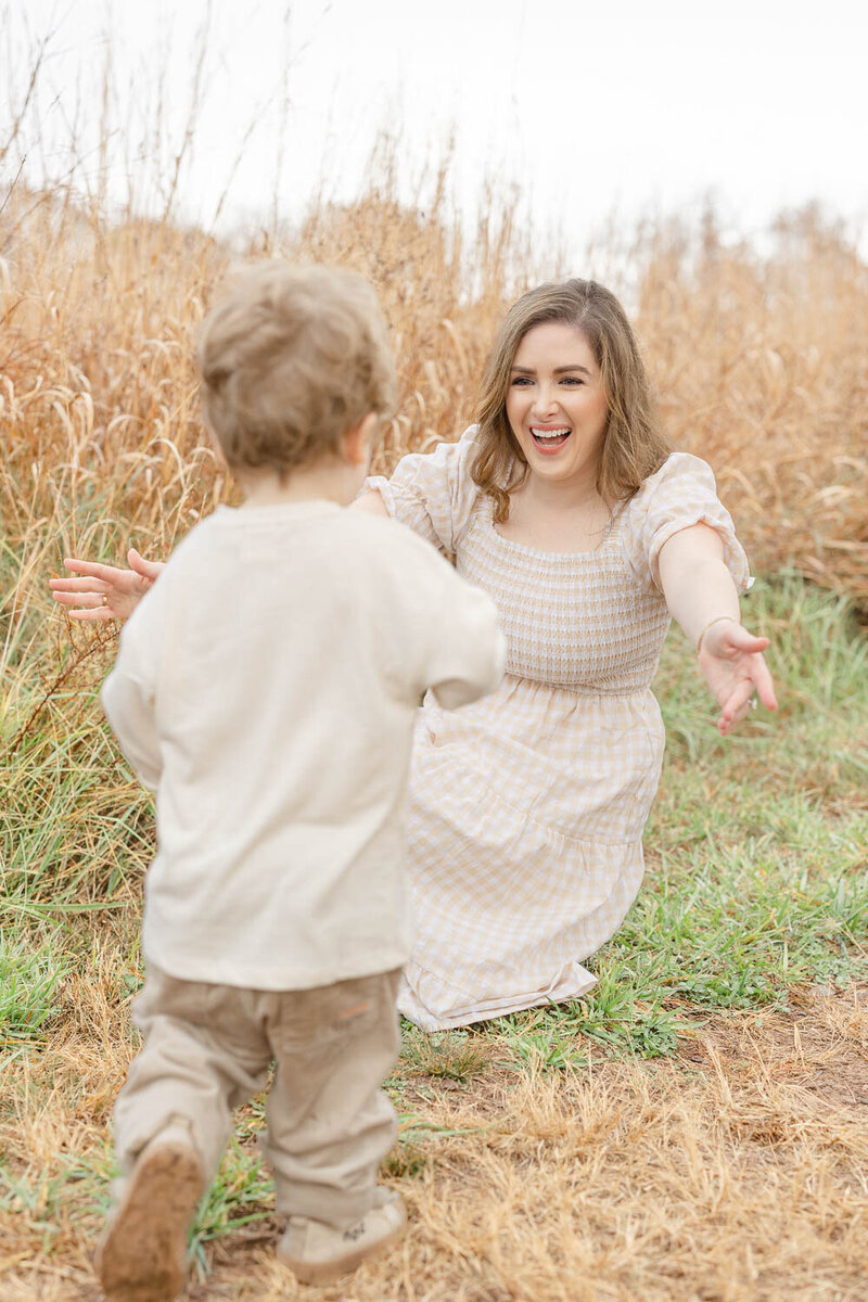 Son running to mom during Manassas, Virginia pictures