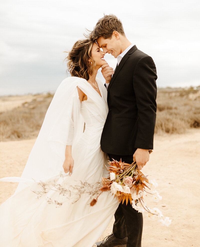 bride and groom at elopement in Laguna Beach