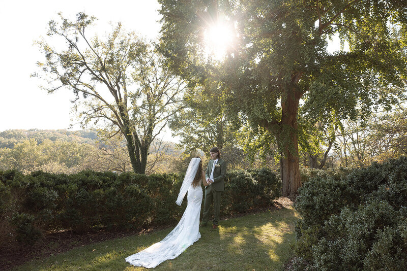 Bride and groom meet for first look and vows under the dreamy golden hour lighting offered at Cheekwood Gardens in Nashville, TN.