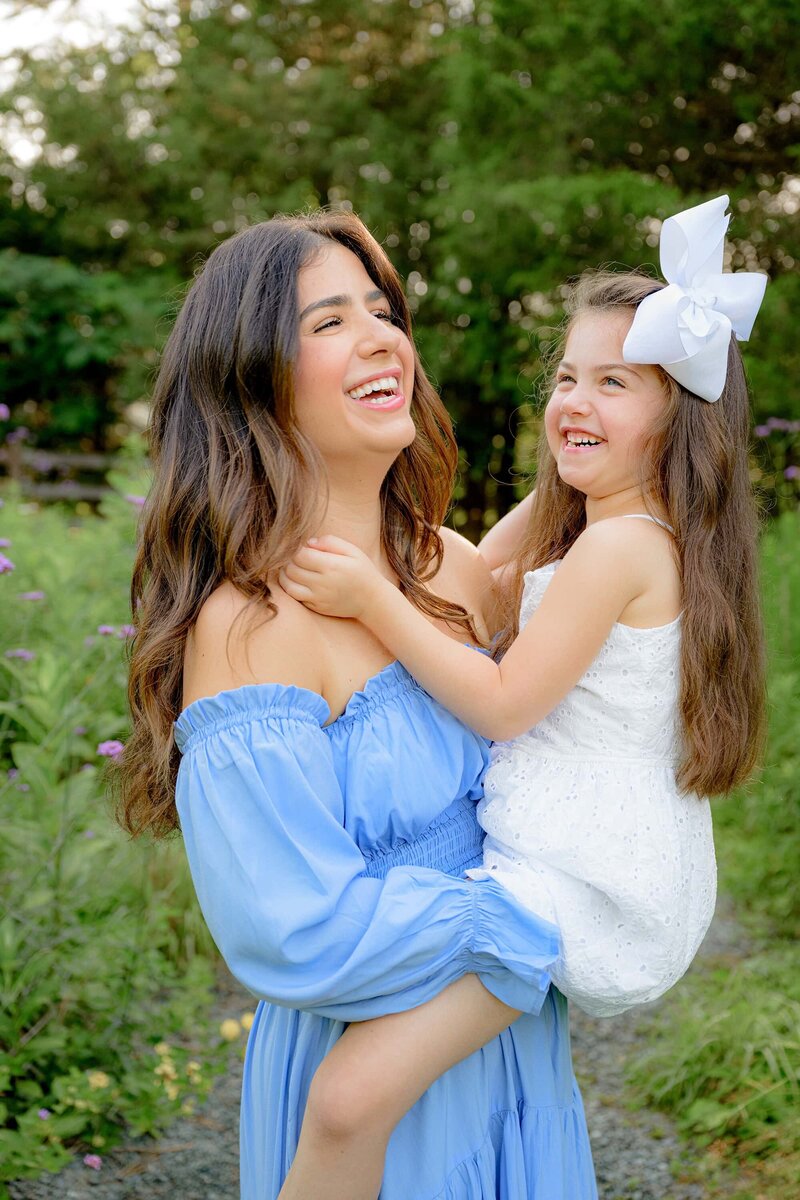mother and daughter laugh during their charlotte mother daughter mini session