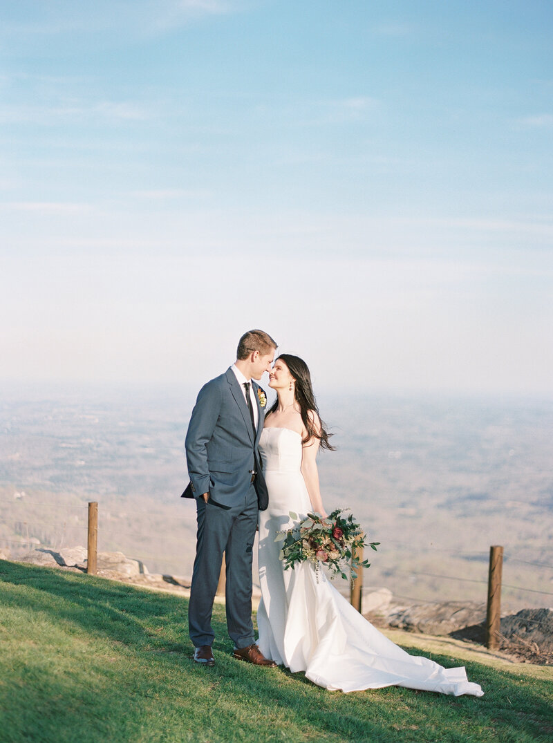 bride and groom looking at camera smiling at Lake Como wedding in Villa del balbianello wedding photographer