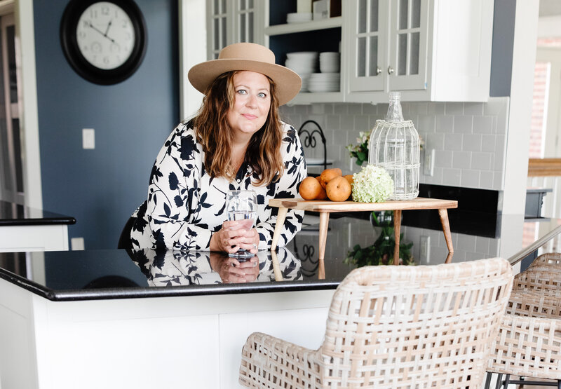 photo of Kari Beckett leaning over a counter