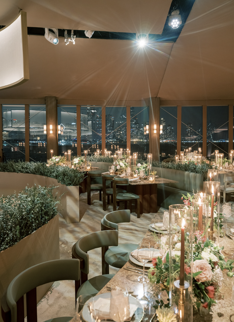 Adler Planetarium Chicago tent set up for a wedding with a view of the Chicago skyline and candlelight