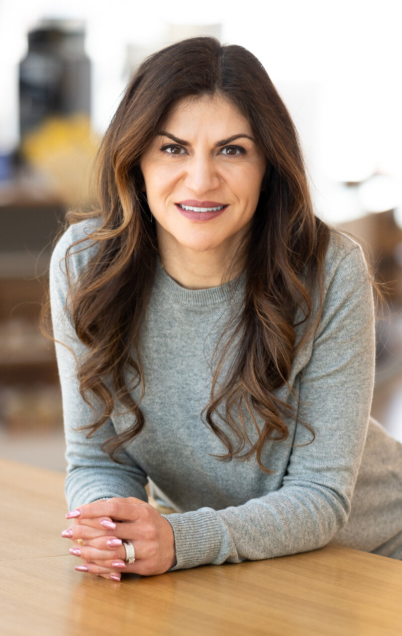 Headshot of Maria Bouzetos grey shirt