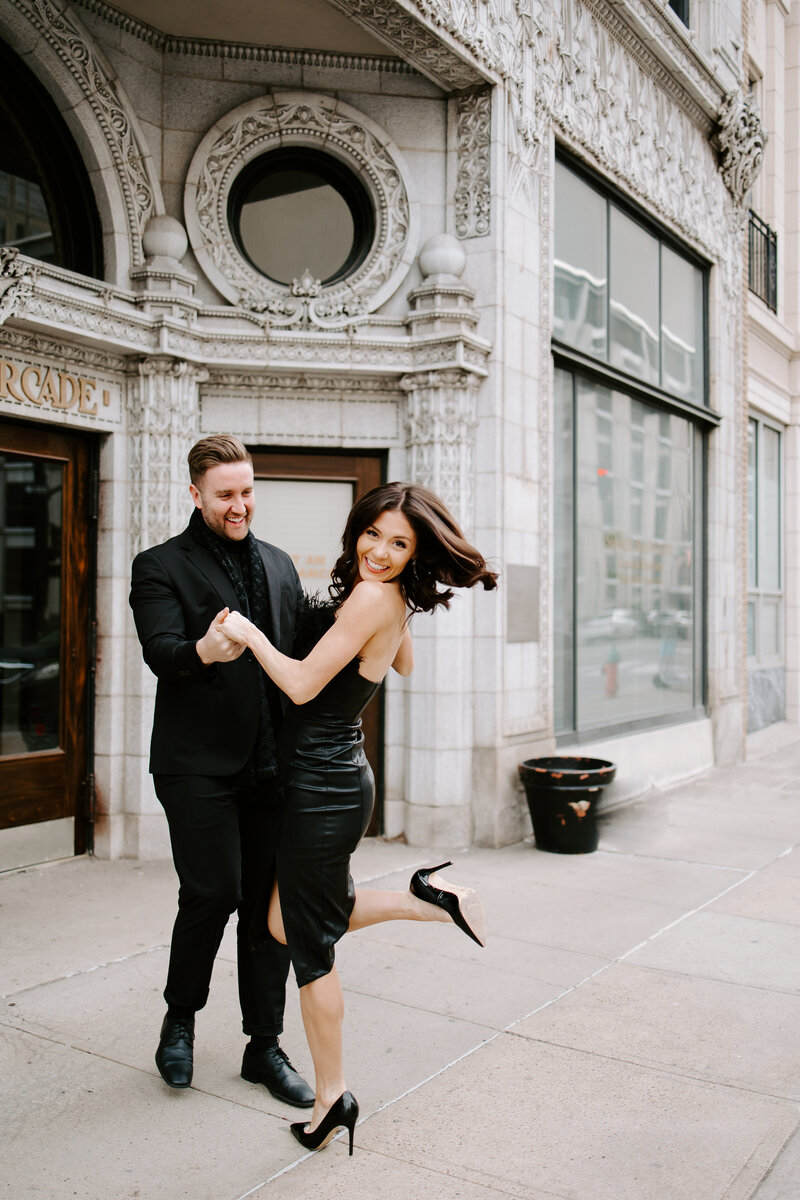 Black and white photo of a couple at their engagement shoot.