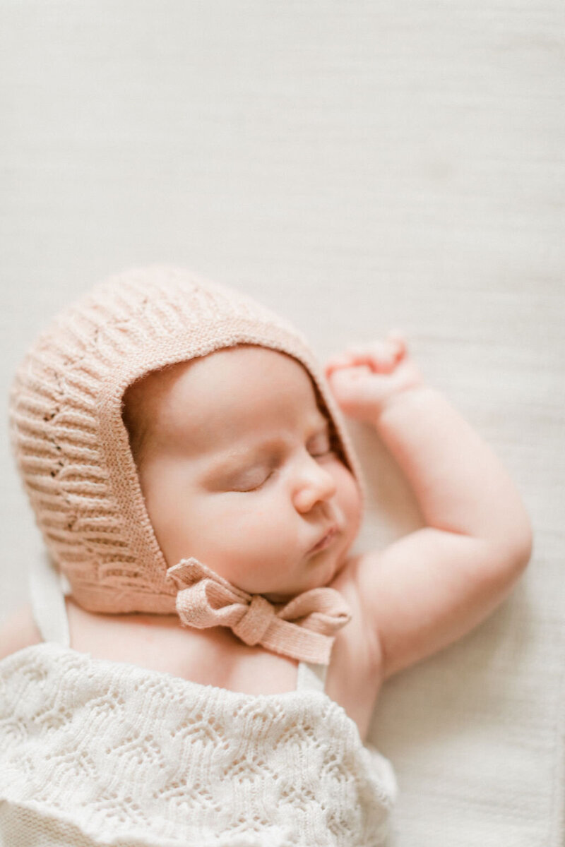 A newborn portrait of a peaceful, sleeping baby. Lifestyle newborn sessions are taking in the natural environment of one's home.