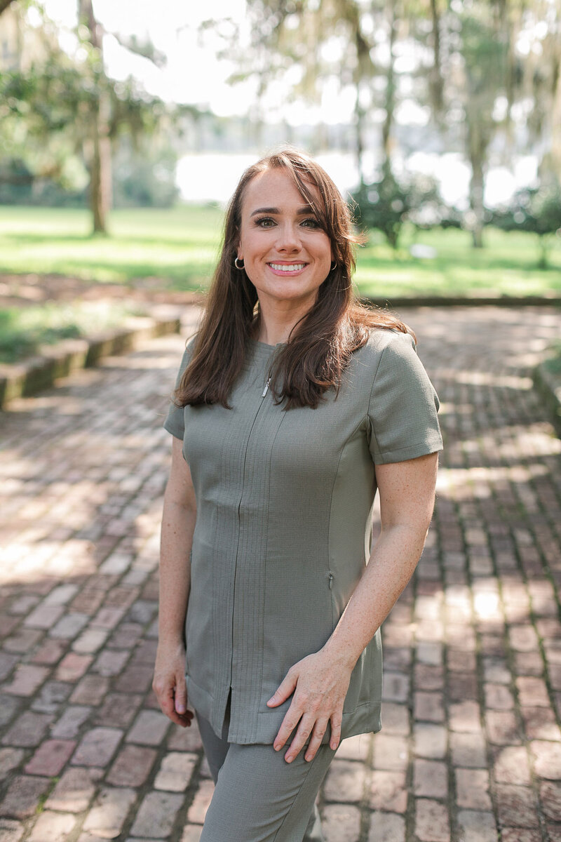 Candice standing outside smiling