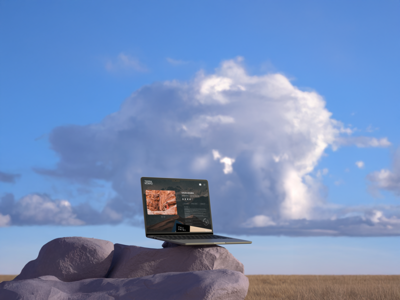 Laptop mockup on rock in nature field background