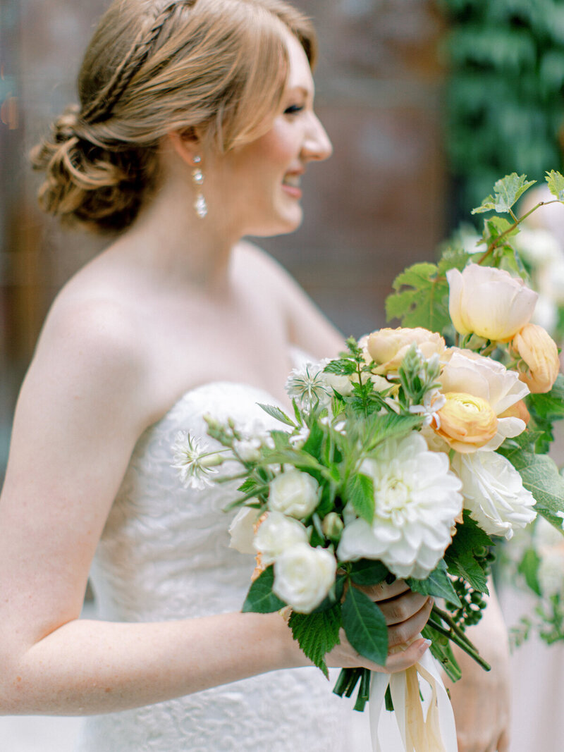 Bride holding bouquet at JM Cellars Wedding in Woodinville Washington