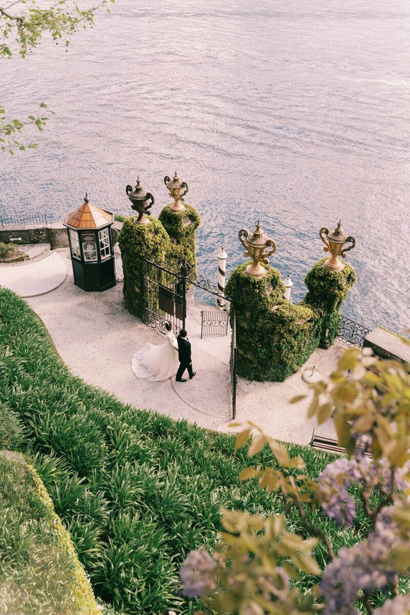  Bridal portrait during a villa del Balbianello wedding, in front of jetty by luxury destination wedding photographer Andreas K. Georgiou  