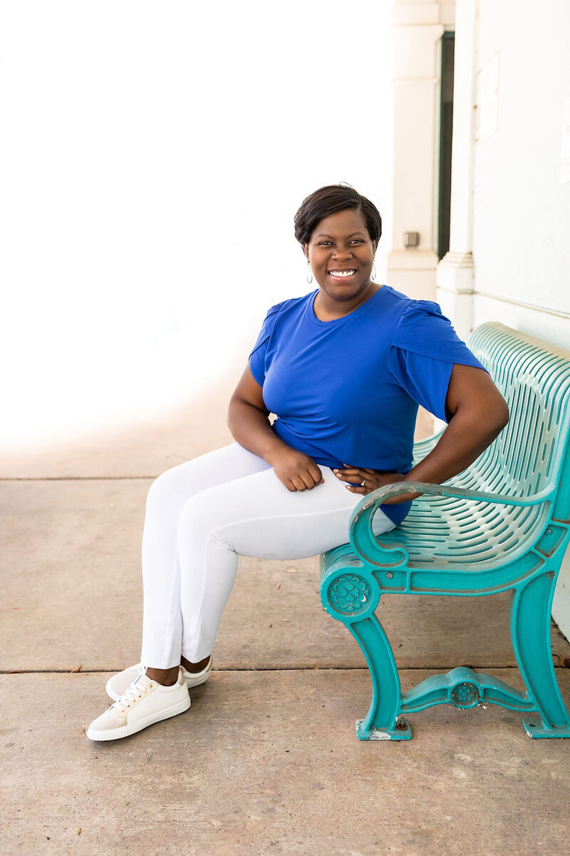 Gala MacCray sitting on bench