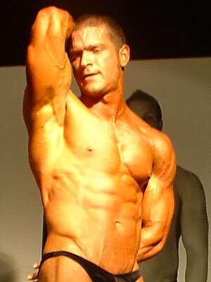 Brent Ray Fraser Abdominal Obliques Posing on Stage The Transitional Culture 2005