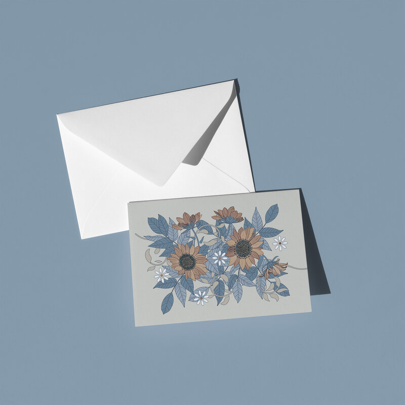 These A6 blank cards are perfect for sending a thoughtful note or simply keeping in your stationery drawer for special moments. Each card showcases a unique hand-drawn design - Peach and tan sunflowers with blue leaves on a tan background - by Green Acre Designs.