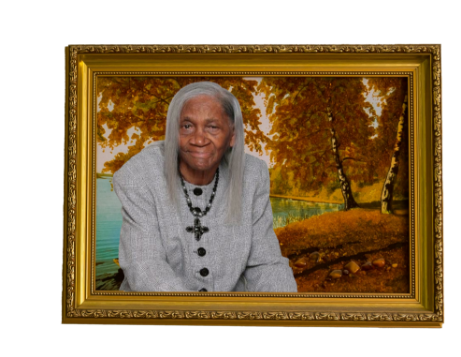 older woman in a gold picture frame