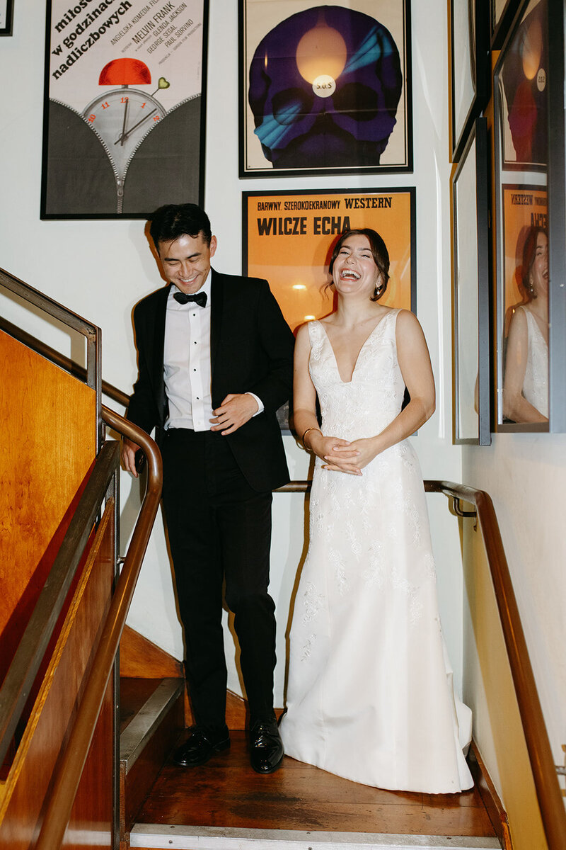 A bride and groom laugh on their wedding day in San Francisco