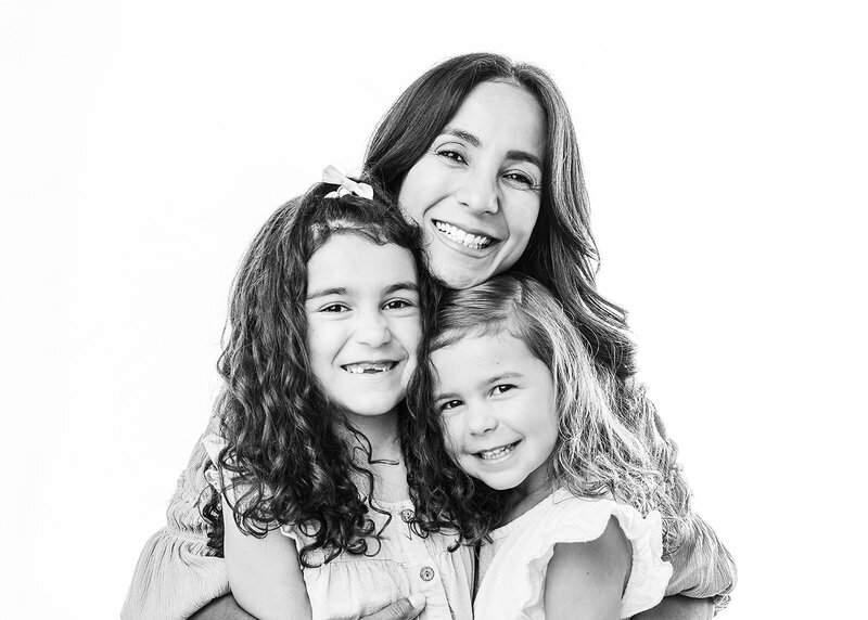 Amazing photo of mom and her two daughter in studio